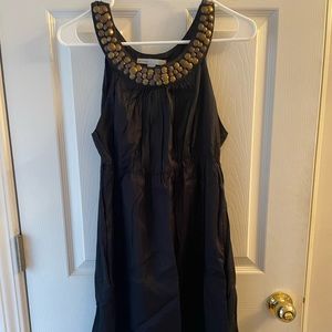Y neck black cocktail dress with metal detail